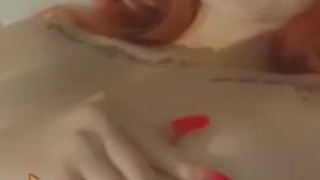 Sexy redhead feeling herself 