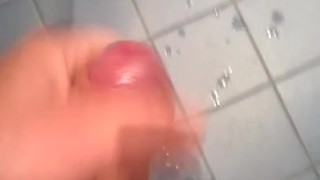 Cumming on blue tile floor