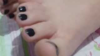 tici_feet @tici_feet tici feet close to my toes in my bed, black toenails