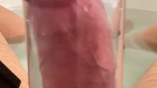 Playing with my penis pump in the bath