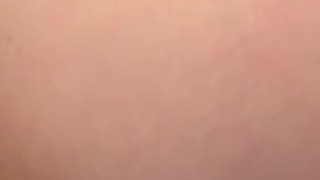 Redhead fucks herself from behind
