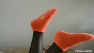 Orange cotton socks and black stockings
