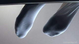 Legs in white socks on the table