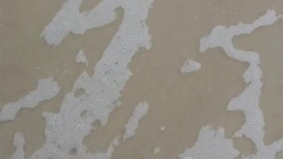 @tici_feet IG tici_feet tici feet walking on the beach red toenails