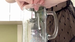Sexy milf in lingerie squirting breastmilk into cup