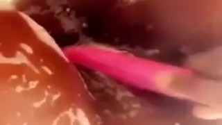 In the shower vibrating my wet soapy pussy