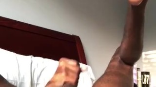 Slim big feet rubs his dick while parents away