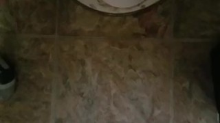 Short bathroom floor piss