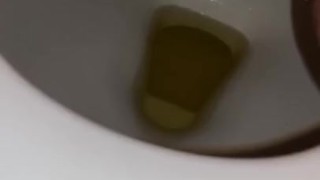 Taking a nice piss after holding it for so long 