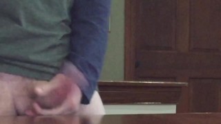 cock slapping solo masturbation in public office space