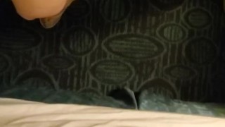 Morning spray on carpet and bed skirt, standing