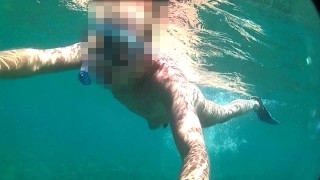 Nude diving and snorkeling in the sea