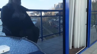Balcony hotel smoking fetish with naked boobs