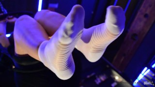 Flying feet in white nylon socks POV