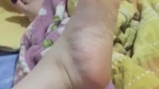 @tici_feet IG tici feet tici_feet rubbing feet with black toenails