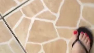 tici_feet tici feet @tici_feet IG walking and dangling black havaianas -red