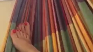 @tici_feet tici feet ig tici_feet red toenails in my hammock - feet