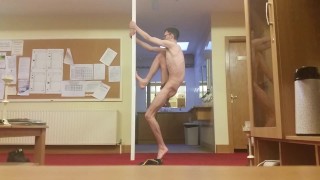 Very skinny tall teen shows off his ribs in a public place using strip pole