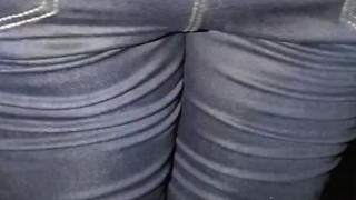 Sexy gf re wets her Jean's in the car, then finishes soaking them standing!
