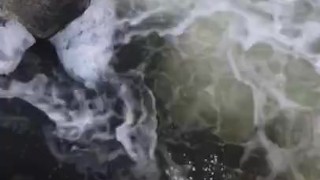 Pissing off a bridge in broad daylight
