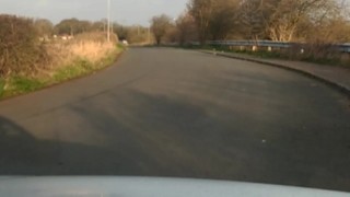 Naked in road with pump on