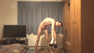 Skinny twink in boxing gloves does shadow boxing and shows off his ribs