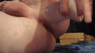 Stuffing a large toy in my ass followed by my fist. 