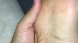 Taking off sweaty sock