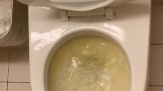 Teen pisses and play with his dick in work bathroom
