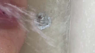 Tight Wet Pussy girl Squirts in the Bathtub