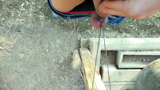 Farmer twink ties his balls , stretches tight balls and jerks off