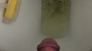 Peeing in the toilet.