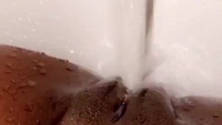 Pussy orgasm from tub faucet 