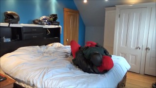 red morphman in leather jacket cums on dummy's face