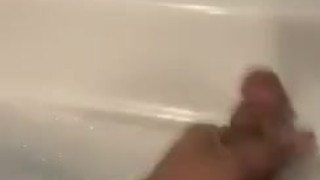 Teen jerks and cums during bath time 