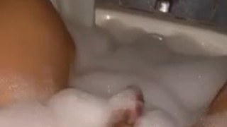 Teen jerks and cums during bath time 