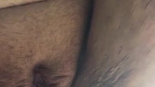 Fat pussy pushing out a big ball in a condom