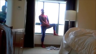 spiderman strips and cums on hotel window