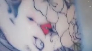 showing them tats....lil tease