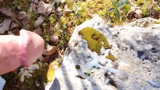 boy strokes and big load of cum on rock