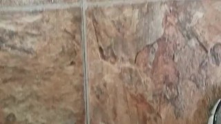 Piss on bathroom floor