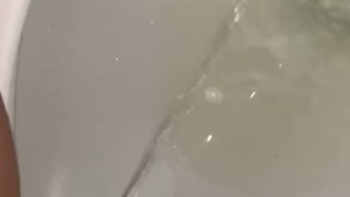 Sitting backwards on the toilet and enjoying this late night piss 