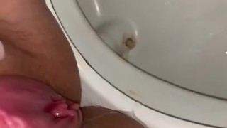 Sitting backwards on the toilet and enjoying this late night piss 
