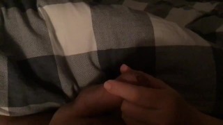 Casual handjob while wife watches tv on smartphone