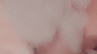 BBW plays with soapy tits in bath