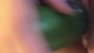 BBW fucks herself with big cucumber