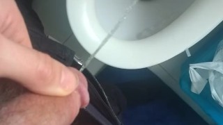 peeing into the toilet