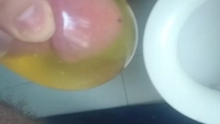 peeing into condom