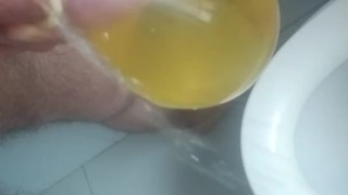 peeing into condom