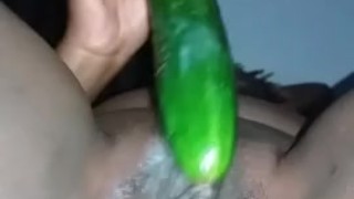 fucking my pussy with a huge cucumber